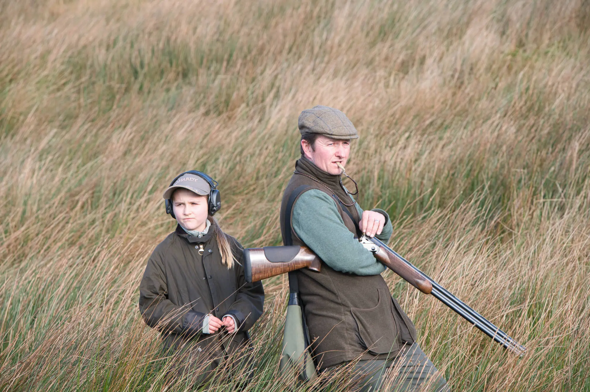 father and daughter on a rough shoot